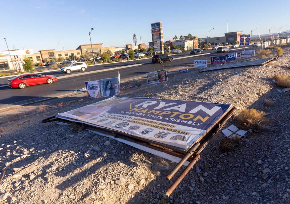 Campaign signs sit along North Hualapai Way a week after elections, Tuesday, Nov. 12, 2024, in ...