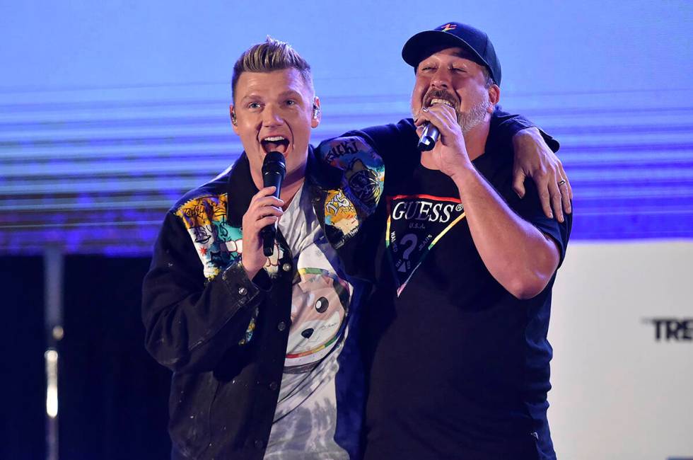 Nick Carter, left, and Joey Fatone perform at Bingo Under the Stars on Friday, June 18, 2021, a ...