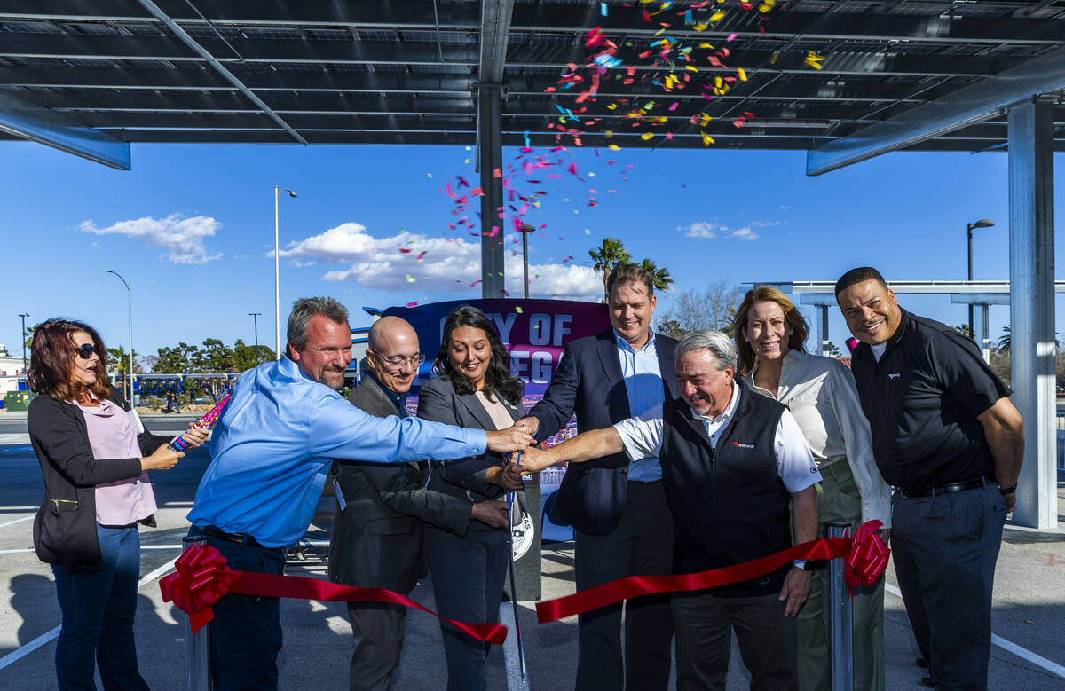 FILE - Members of NV Energy and the city of Las Vegas conduct a ribbon cutting ceremony a commu ...