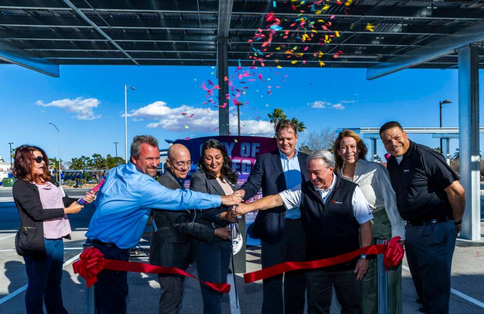 FILE - Members of NV Energy and the city of Las Vegas conduct a ribbon cutting ceremony a commu ...