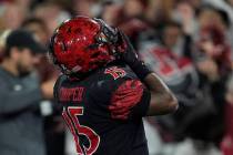 San Diego State running back Marquez Cooper celebrates after scoring a touchdown during the fir ...