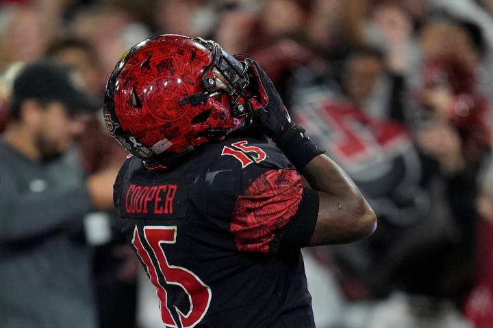 San Diego State running back Marquez Cooper celebrates after scoring a touchdown during the fir ...