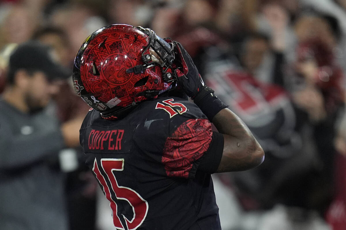 San Diego State running back Marquez Cooper celebrates after scoring a touchdown during the fir ...