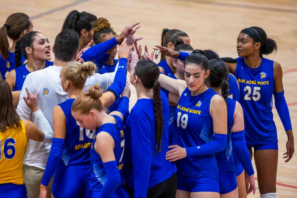 San Jose State players come together on a timeout against UNLV during the first set of their NC ...