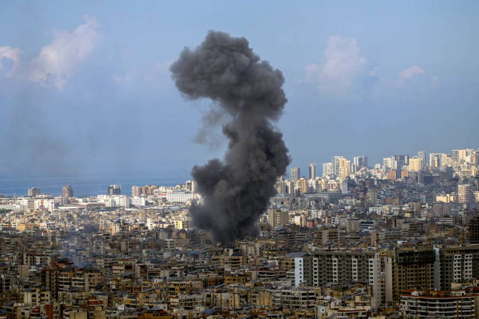 Smoke rises after an Israeli airstrike on Dahiyeh, in the southern suburb of Beirut, Lebanon, W ...