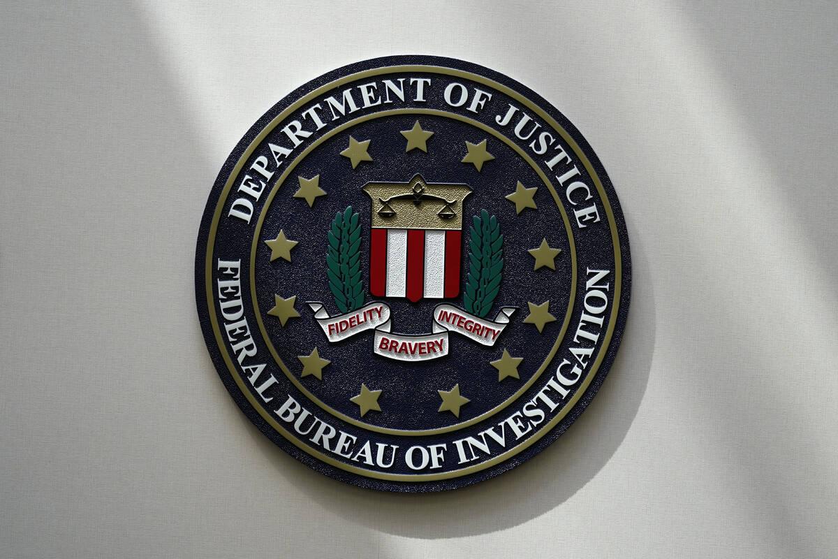 FILE - The FBI seal is pictured in Omaha, Neb., Aug. 10, 2022. (AP Photo/Charlie Neibergall, File)