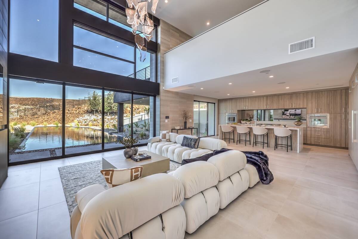 IndyCar driver Colton Herta purchased the $5.4 million Blue Heron home on Dragon Peak Drive in ...