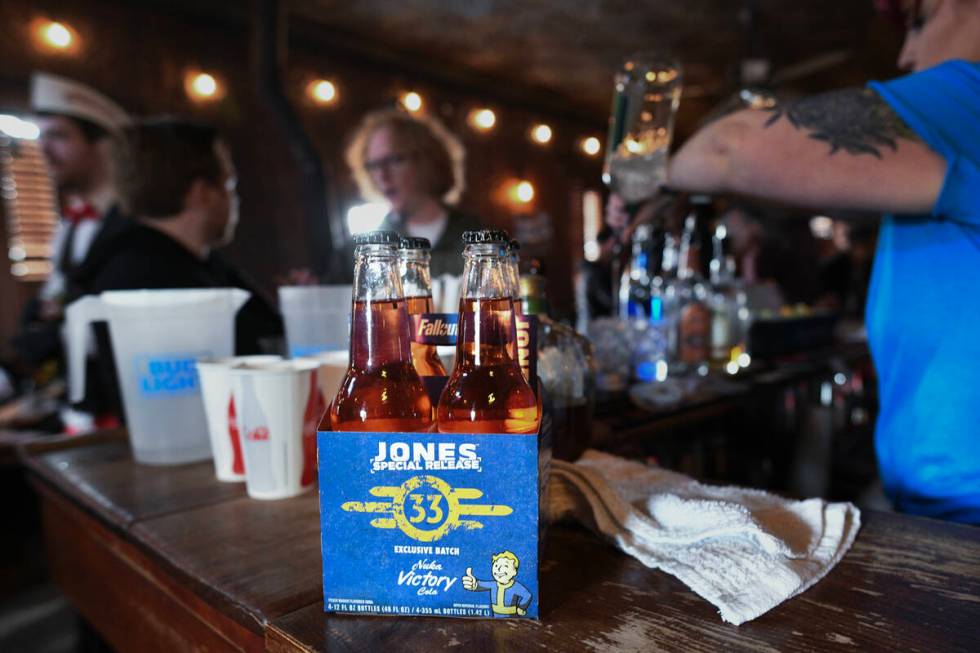 Bottles of “Nuke Victory Cola” from Jones Soda sits on the bar during the Fallout ...