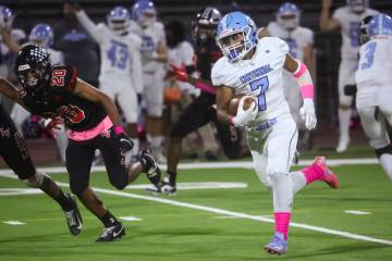 Centennial wide receiver Dale Flores Jr. (7) runs the ball during a football game at Las Vegas ...