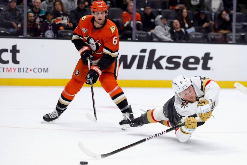 Vegas Golden Knights center Jack Eichel, right, shoots against Anaheim Ducks defenseman Brian D ...