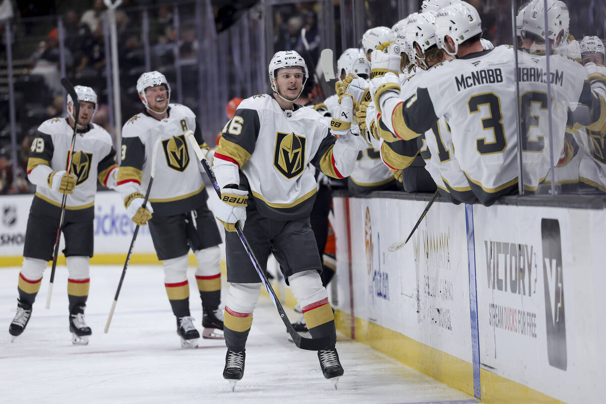 Vegas Golden Knights left wing Pavel Dorofeyev celebrates with the bench after scoring during t ...