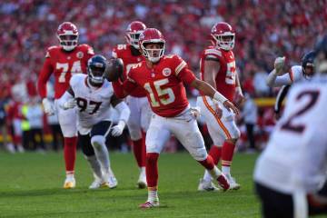 Kansas City Chiefs quarterback Patrick Mahomes (15) throws during the second half of an NFL foo ...