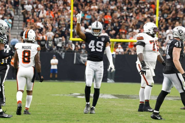 Raiders defensive end Charles Snowden (49) reacts after sacking the Cleveland Browns quarterbac ...