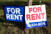 Signs advertising housing for rent are displayed in Glenview, Ill., on Jan. 29, 2024. (AP Photo ...