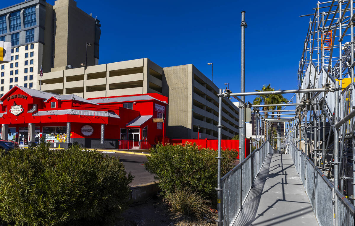 One of the entrances to Jays Market is blocked by a temporary pedestrian bridge over Koval Lane ...