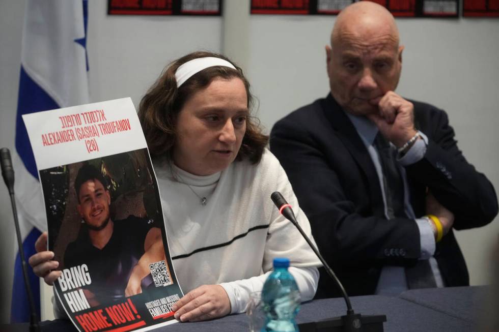 Elena Troufanov, left, and Louis Har, former Israeli hostages and relatives of some still being ...