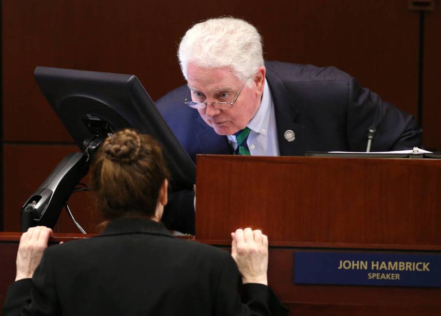 Nevada Assembly Speaker John Hambrick, R-Las Vegas, talks with Chief Clerk Susan Furlong on the ...