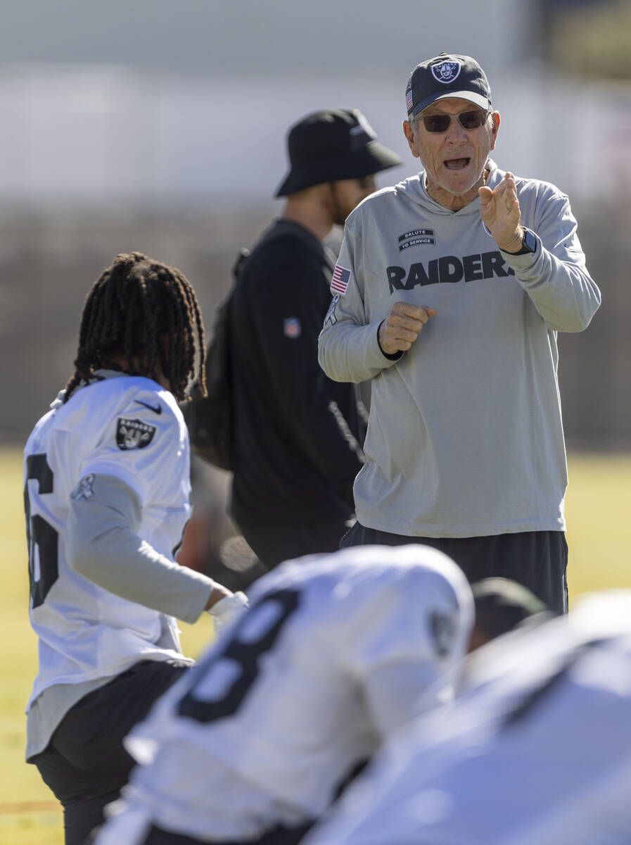 Raiders senior offensive advisor Norv Turner speaks to wide receiver Jakobi Meyers (16) during ...