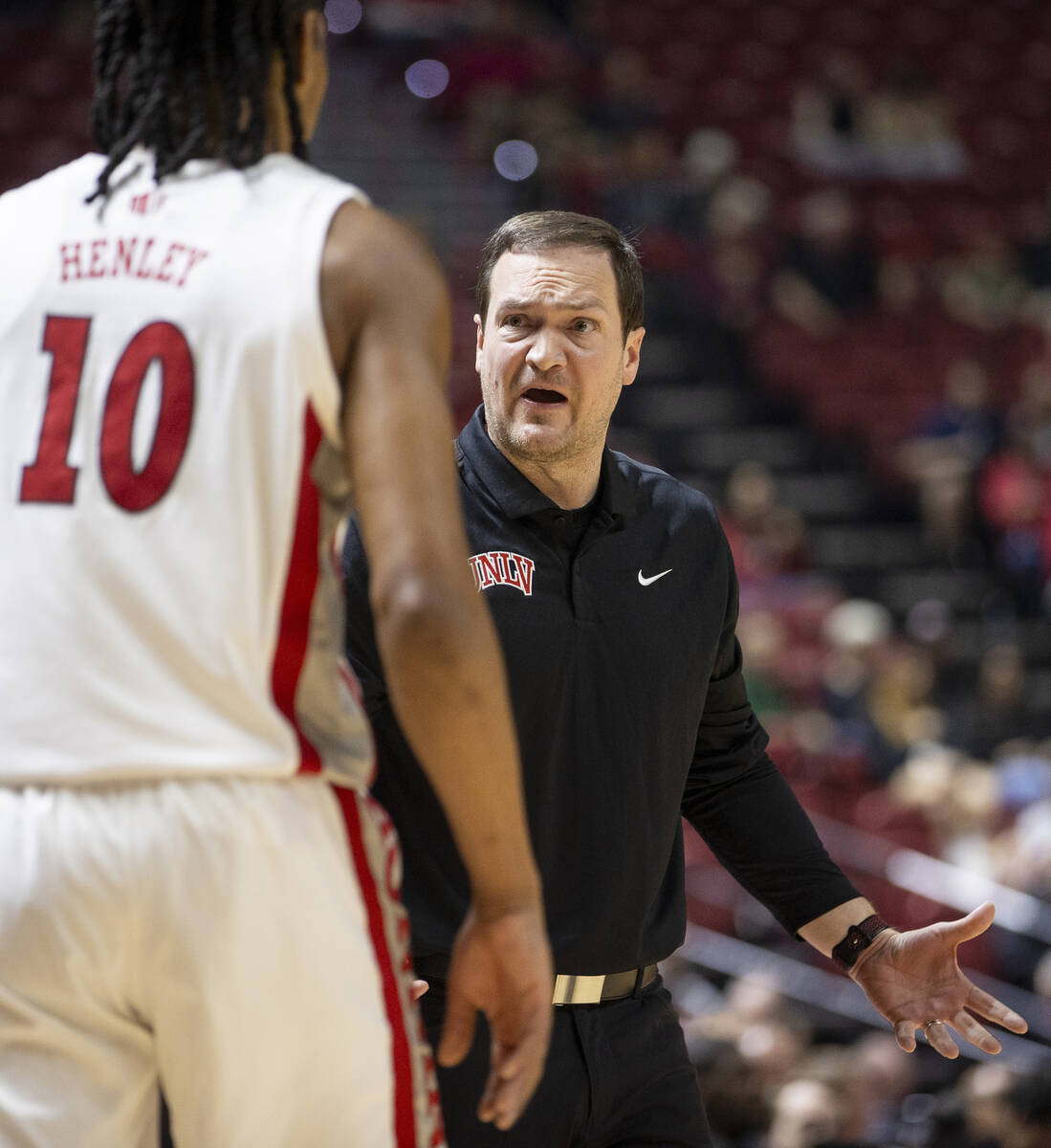 UNLV head coach Kevin Kruger yells at guard Jaden Henley (10) during the college basketball gam ...