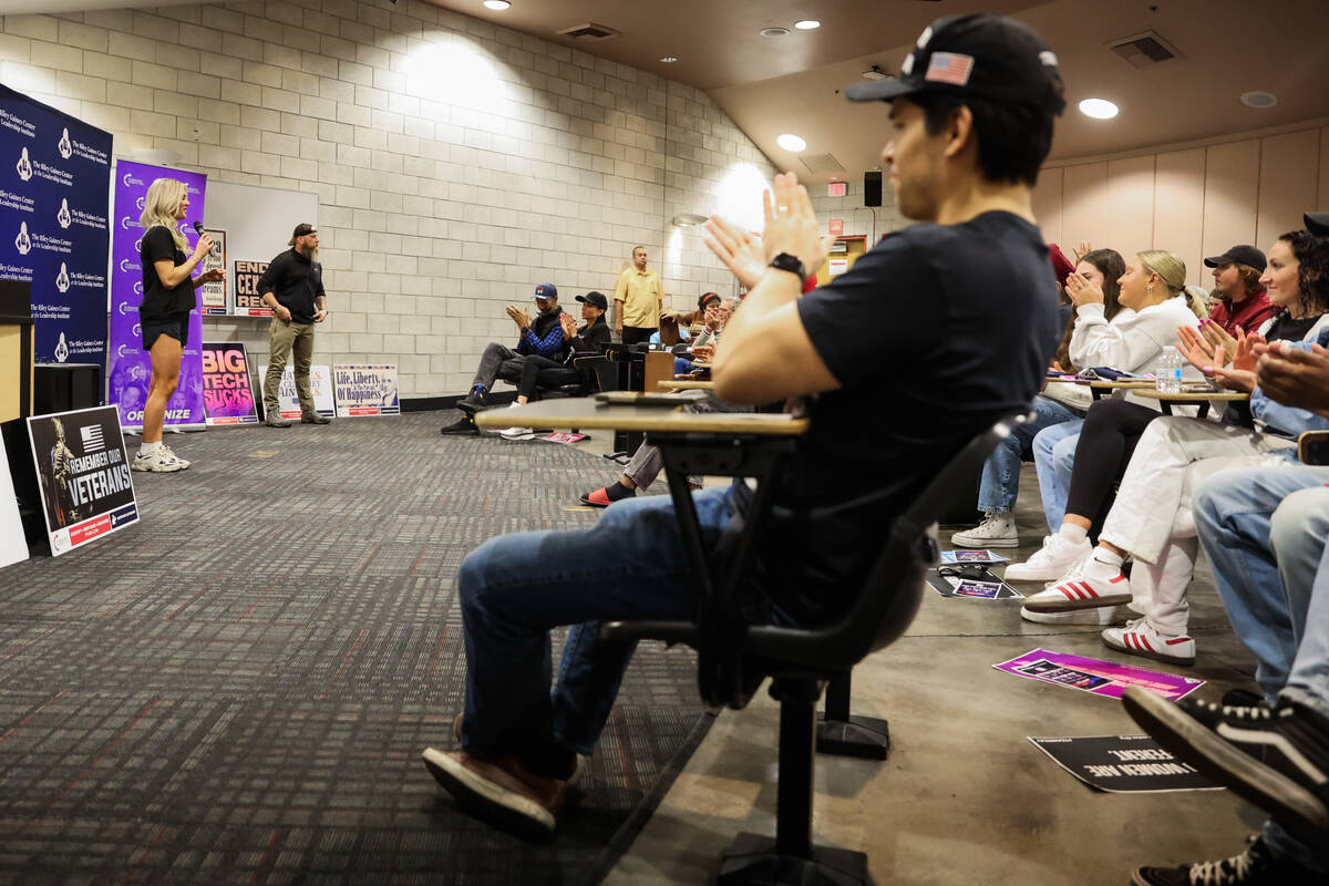 Supporters listen to Riley Gaines speak during an event hosted by UNLV’s turning point c ...