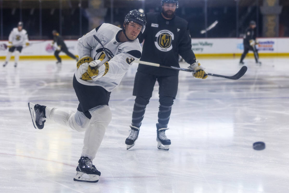 Golden Knights defenseman Brayden McNabb (3) takes a shot at the goal during training camp at C ...