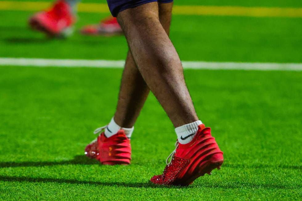 Coronado athlete Marquesion Floyde wears bejeweled cleats during a Class 5A Division I state se ...