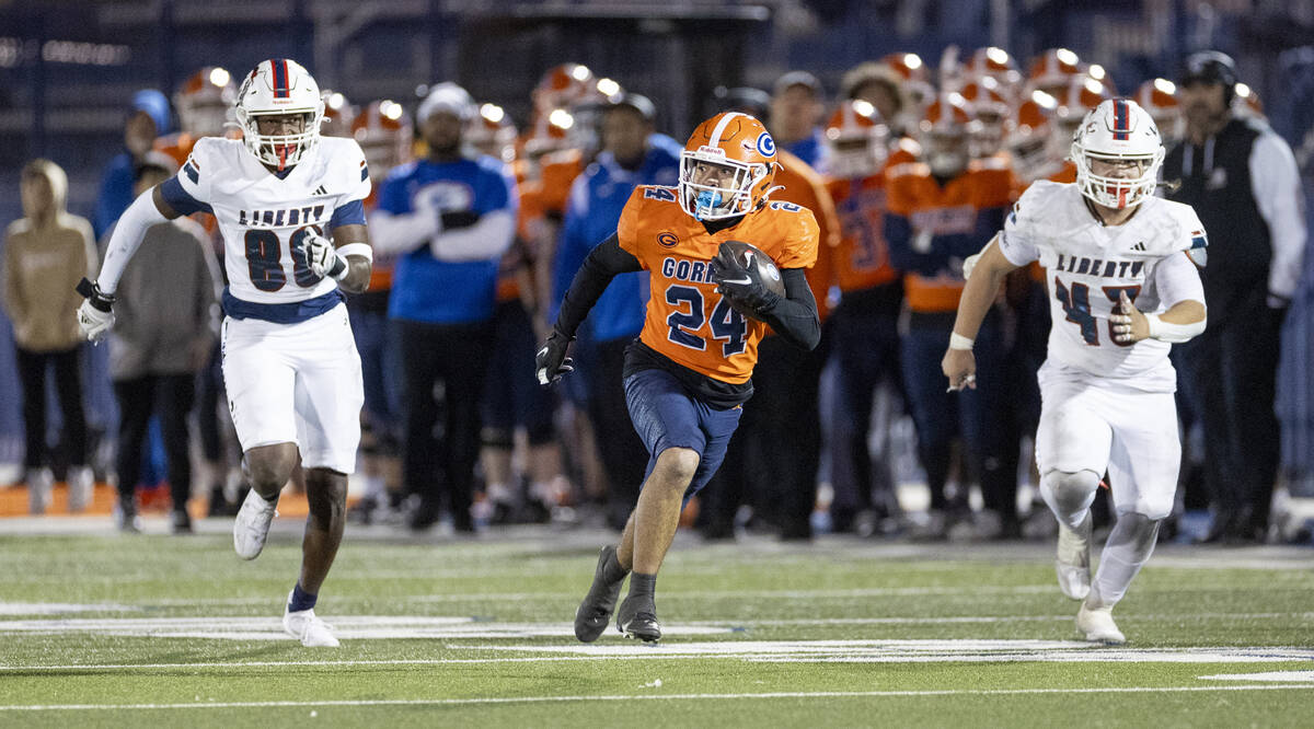 Bishop Gorman running back Myles Norman (24) runs down the field during the Class 5A Division I ...