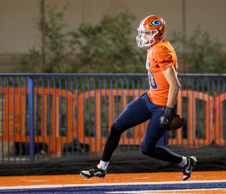 Bishop Gorman wide receiver Derek Meadows (30) scores a touchdown during the Class 5A Division ...