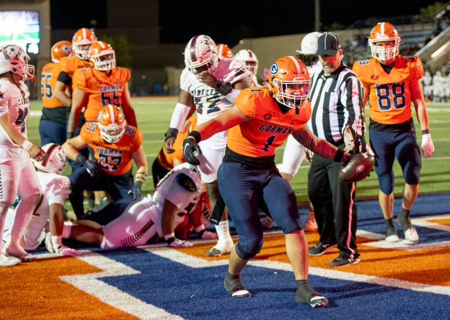 Bishop Gorman linebacker Champ Kapanui (1) celebrates after scoring a touchdown during the Clas ...