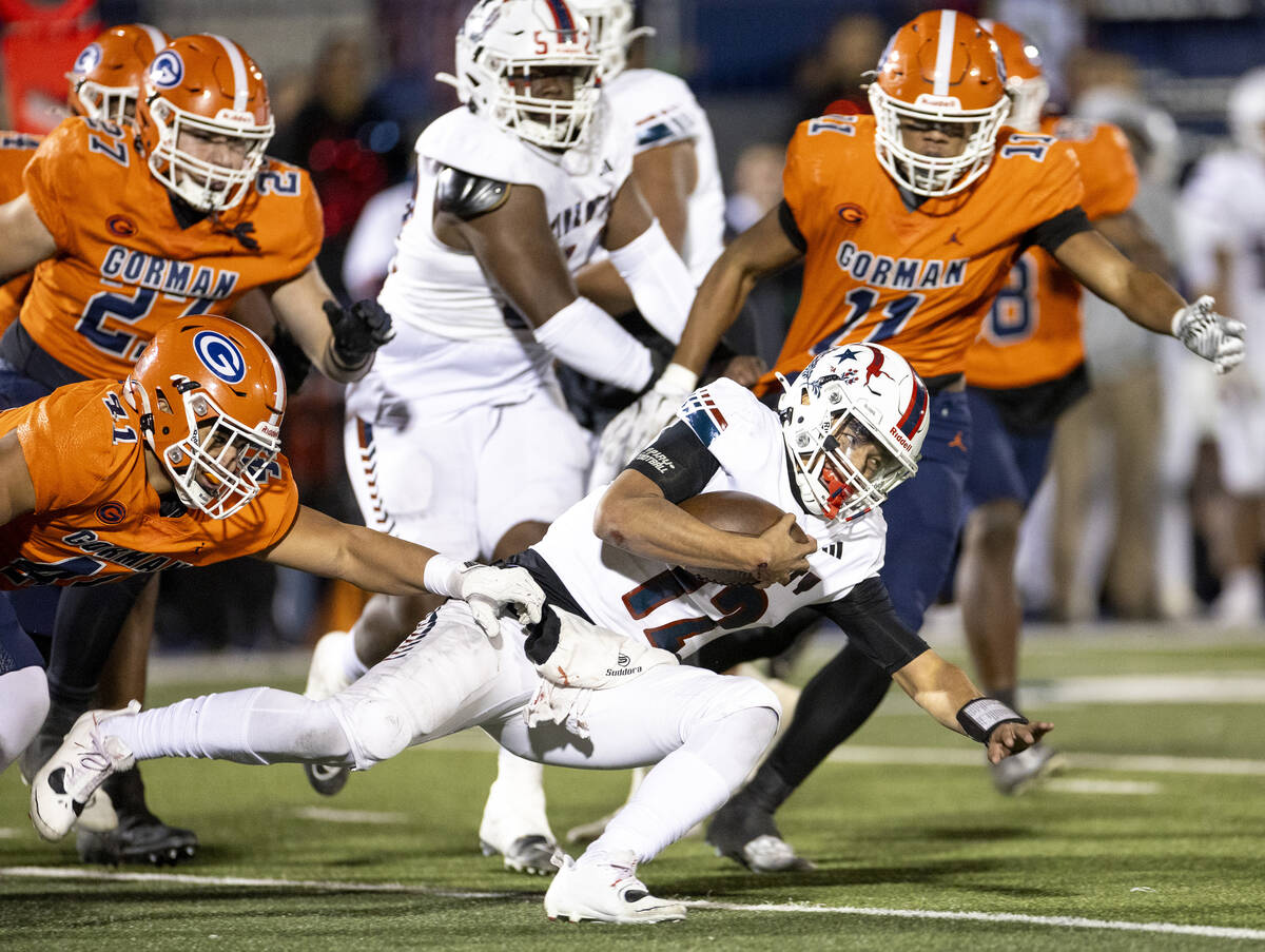 Liberty quarterback Elijah Espinoza (12) dives forward during the Class 5A Division I state sem ...