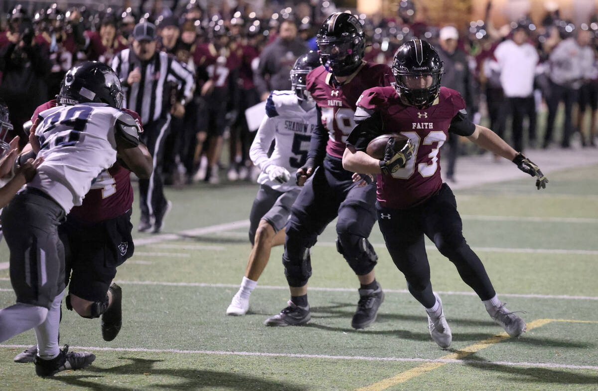 Faith Lutheran running back Justin Robbins (33) runs for a touchdown against Shadow Ridge in th ...