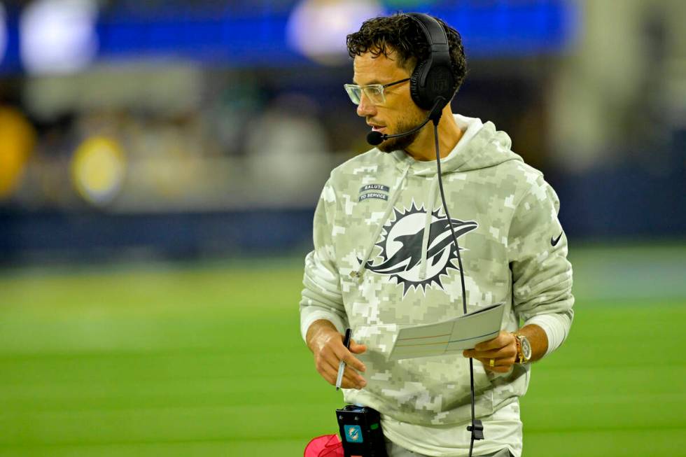 Miami Dolphins head coach Mike McDaniel looks on from the sidelines during an NFL football game ...