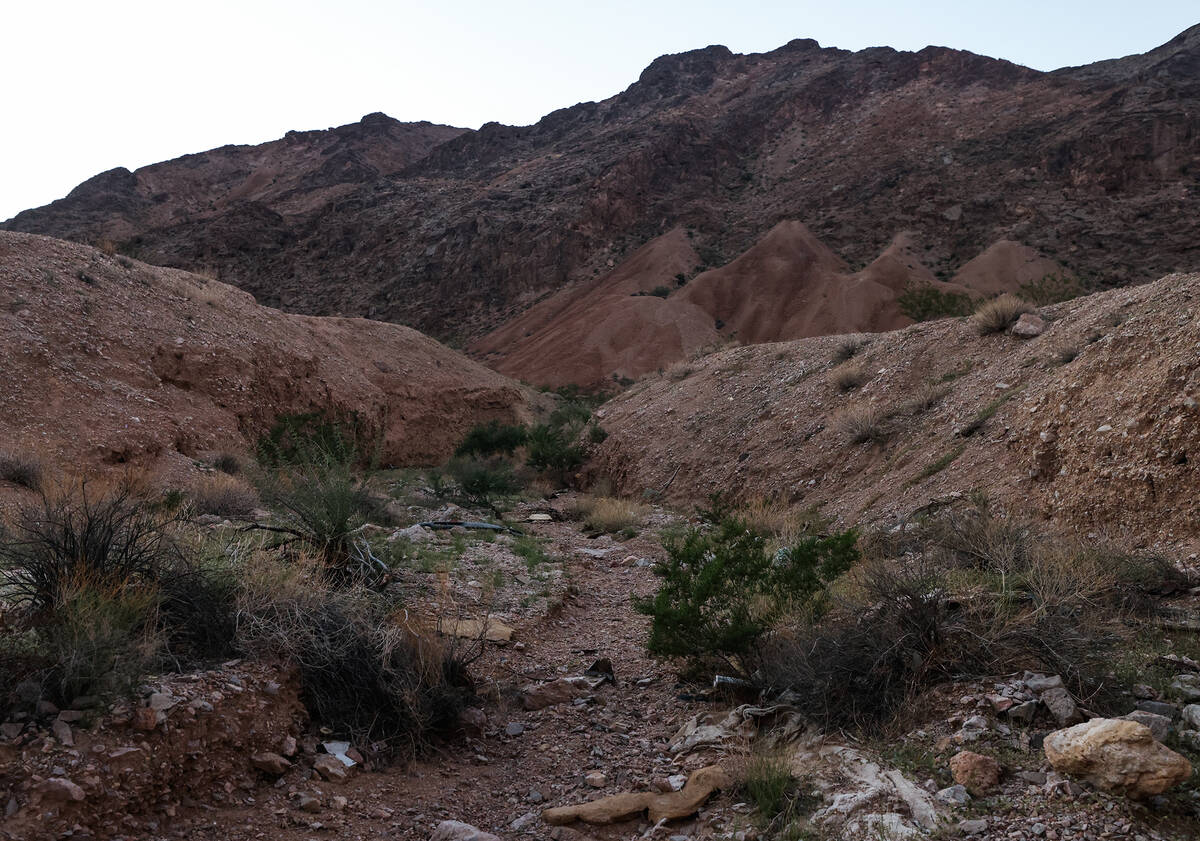 The wash where a truck carrying three suspected car thieves crashed after a shooting by a Burea ...