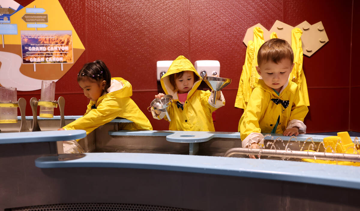 Catalina Cuenca, 2, of Las Vegas, from left, and Isabelle Sunwoo, 1, and Ezra Sunwoo, 3, of Gre ...