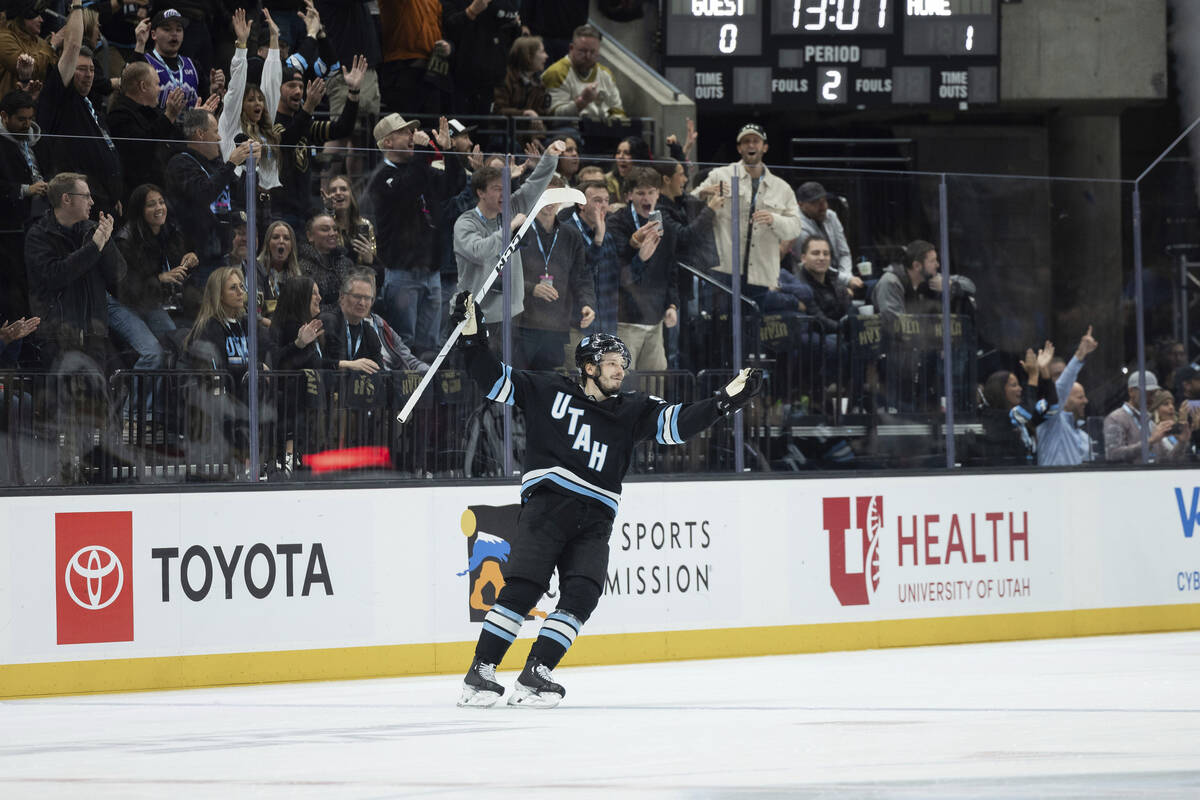 Utah Hockey Club defenseman Mikhail Sergachev (98) celebrates his goal against Vegas Knights du ...