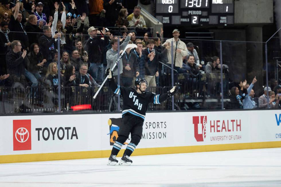 Utah Hockey Club defenseman Mikhail Sergachev (98) celebrates his goal against Vegas Knights du ...