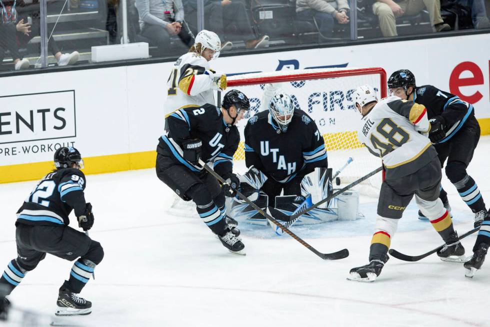 Vegas Golden Knights center Tomas Hertl (48) scores a goal on Utah Hockey Club goaltender Karel ...