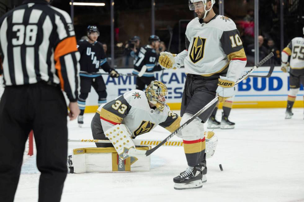 Vegas Golden Knights goaltender Adin Hill (33) saves the puck against Utah Hockey Club during t ...