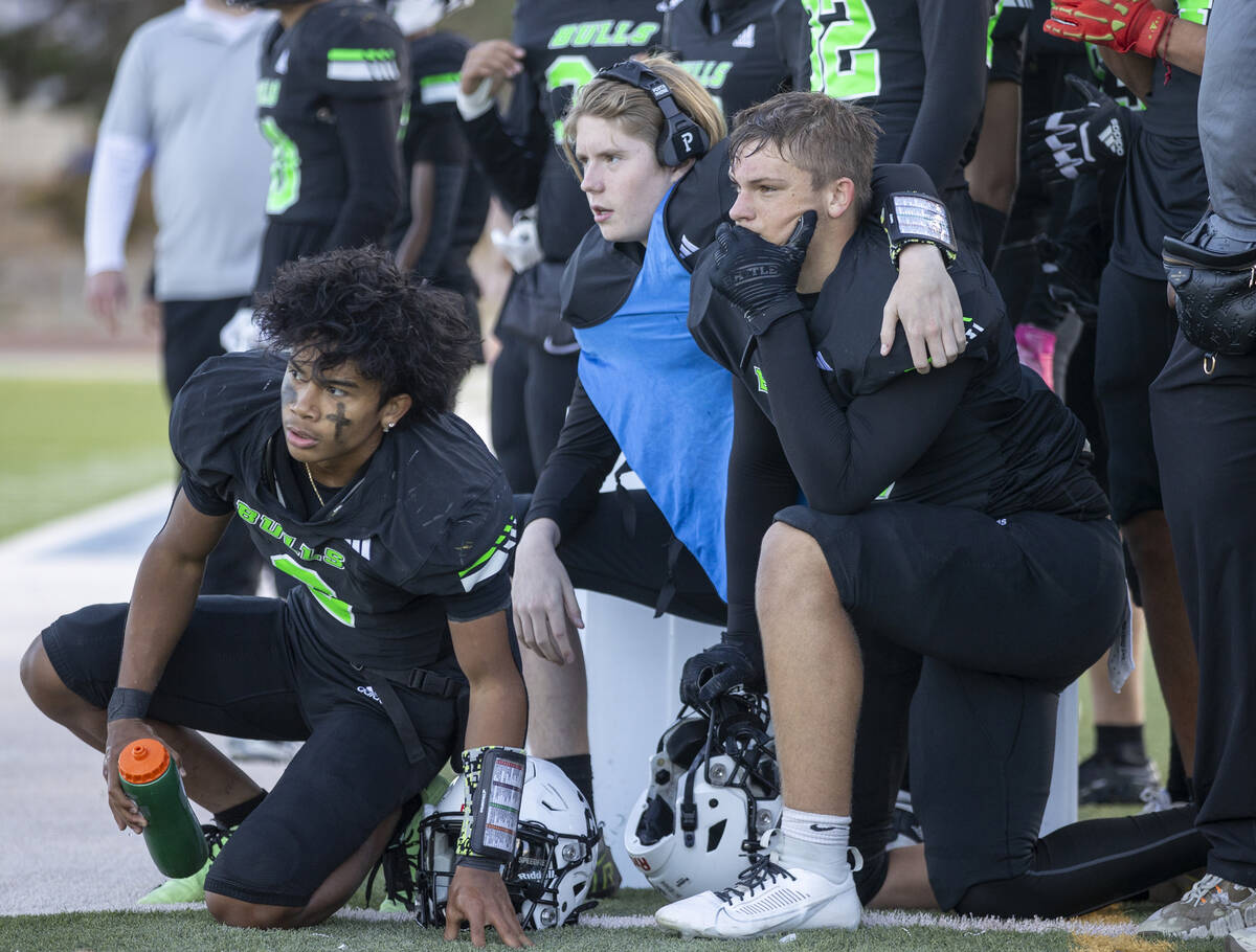 Members of SLAM Academy watch as Churchill County players prepare to attempt a two-point conver ...