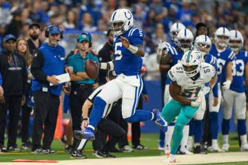 Indianapolis Colts quarterback Anthony Richardson (5) runs down the sidelines during an NFL foo ...