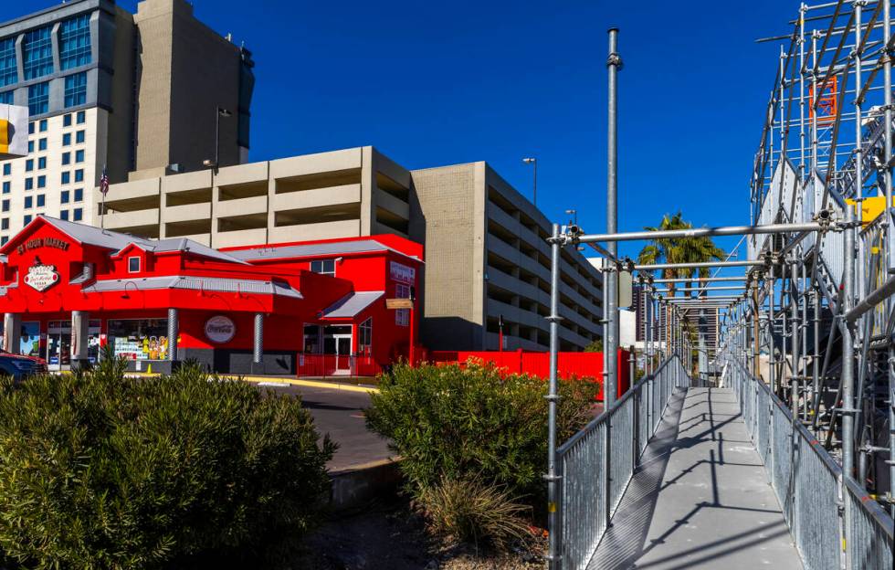 One of the entrances to Jays Market is blocked by a temporary pedestrian bridge over Koval Lane ...