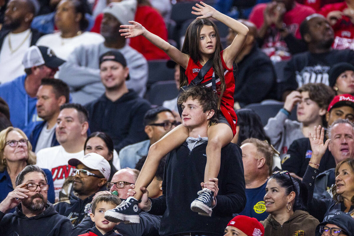 UNLV fans have fun as the team dominates the San Diego State Aztecs during the first half of th ...