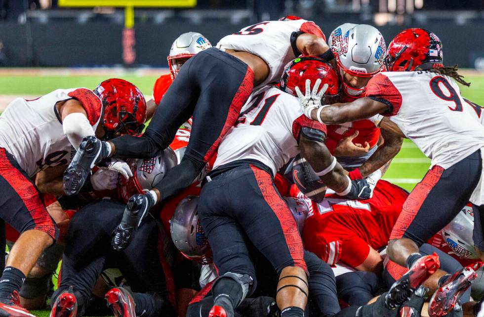 UNLV quarterback Cameron Friel (7) fumbles the ball while attempting to score near the end zone ...