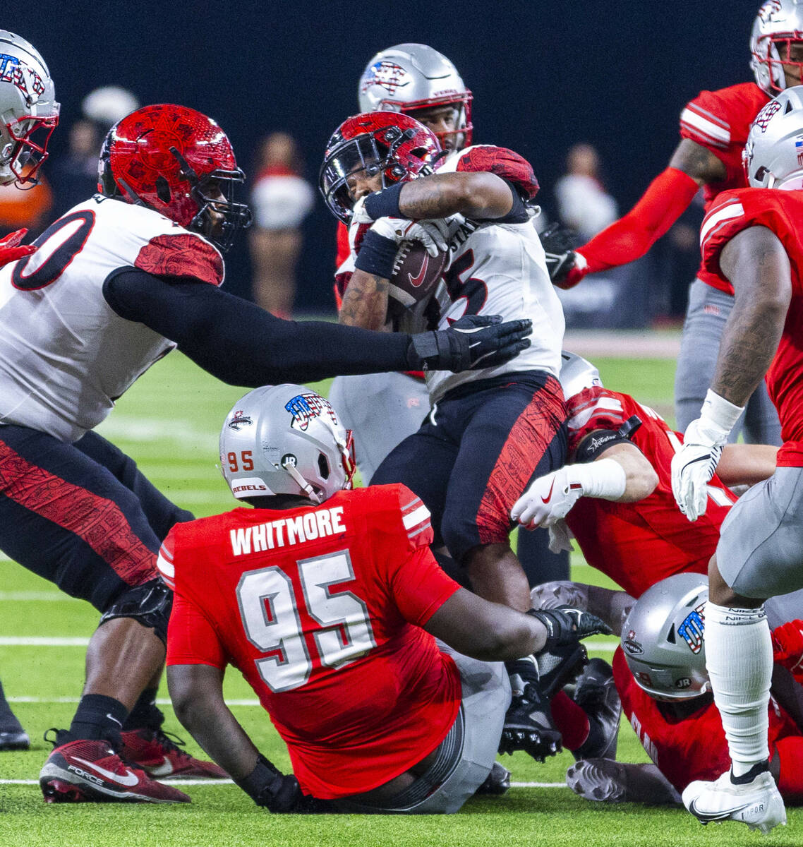 San Diego State Aztecs quarterback Danny O'Neil (5) is sacked by the UNLV defense during the fi ...