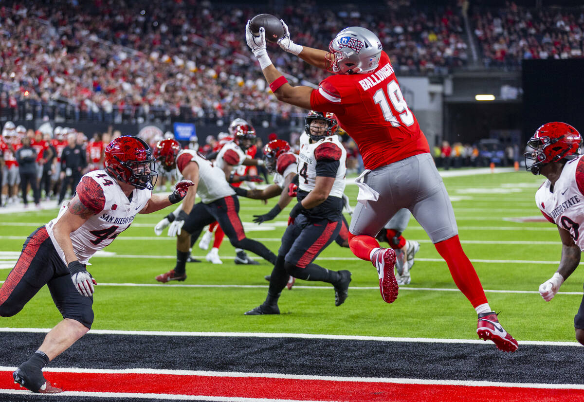 UNLV tight end Kaleo Ballungay (19) elevates for a touchdown reception as San Diego State Aztec ...