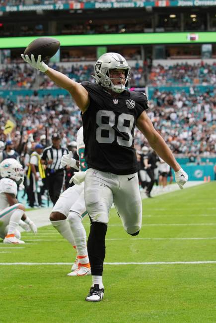 Las Vegas Raiders tight end Brock Bowers (89) scores a touchdown during the second half of an N ...