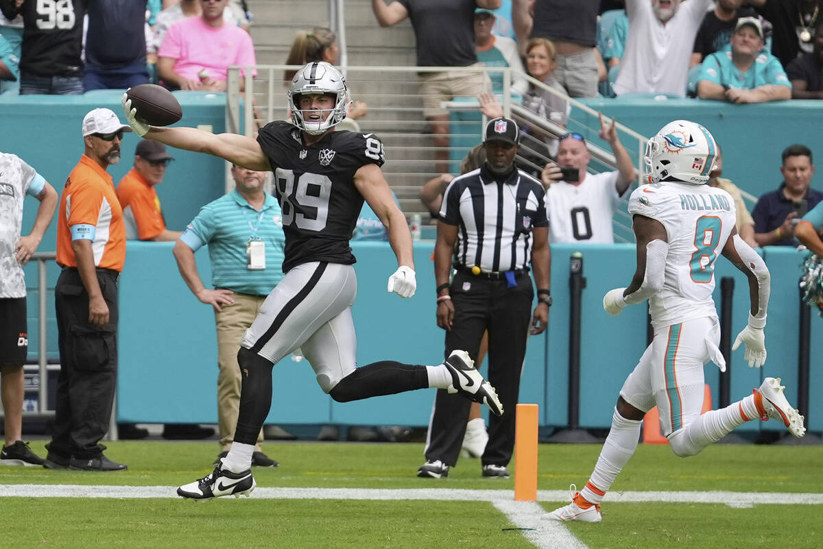 Las Vegas Raiders tight end Brock Bowers (89) scores a touchdown during the second half of an N ...