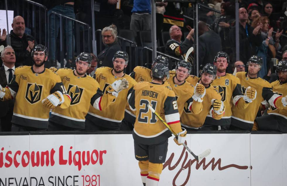 Golden Knights center Brett Howden (21) celebrates his goal with teammates during the first per ...