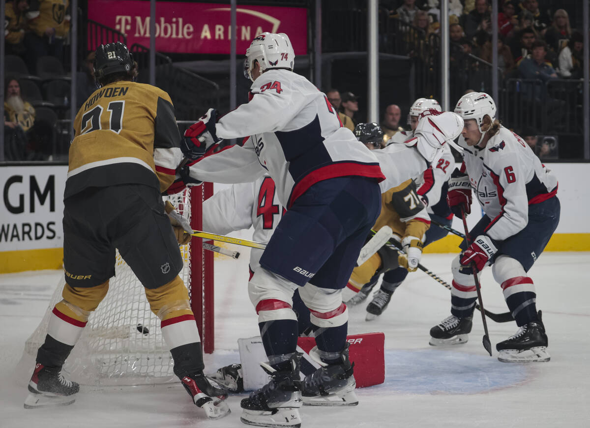 Golden Knights center Brett Howden (21) scores a goal against Washington Capitals during the fi ...