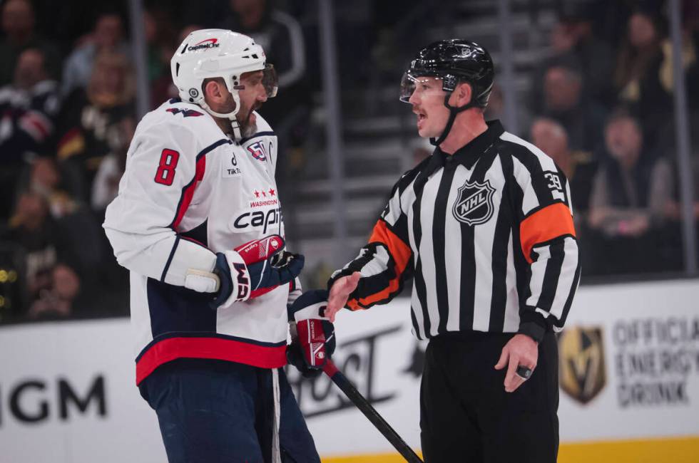 Washington Capitals left wing Alex Ovechkin (8) argues a call with referee Brandon Blandina (39 ...